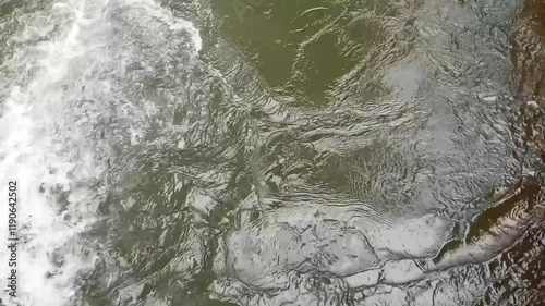 water flowing into the water. water background. Horizontal format. 