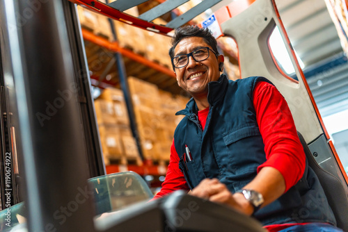 Latin worker using forklift in a distribution warehouse