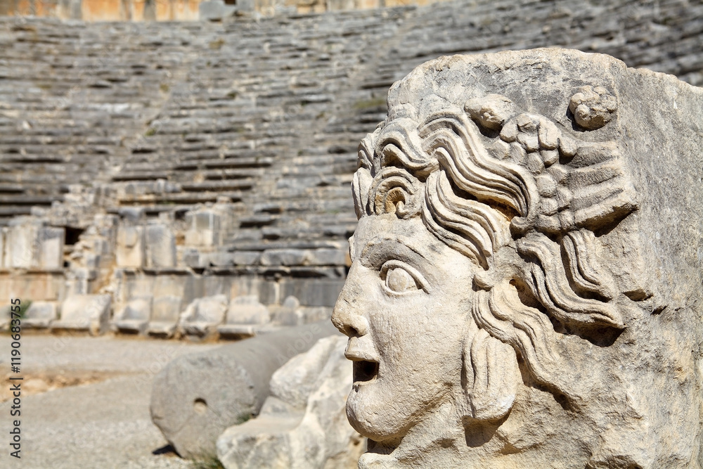 Stone faces in Myra, an ancient town in Lycia where nowday there is the town of Demre, Turkey Stone faces in Myra, an ancient town in Lycia where nowday there is the town of Demre, Turkey