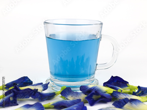 Teh bunga telang or Butterfly flower tea is a herbal drink made from steeping butterfly pea flowers (Clitoria ternatea). photo