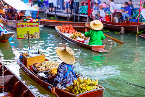 Traditional floating market in Damnoen Saduak near Bangkok, Thailand. Famous floating market in Thailand.