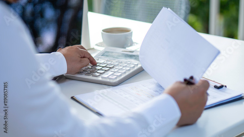 Obraz na płótnie businesswoman check company finances and earnings and budget. Business woman calculating expenses, managing budget, papers, loan documents, invoices. count taxes rental tenancy sum to pay online. w salonie