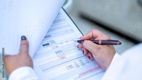 Obraz na płótnie Business woman calculating expenses, managing budget, papers, loan documents, invoices. count taxes rental tenancy sum to pay online. businesswoman check company finances and earnings and budget. w salonie