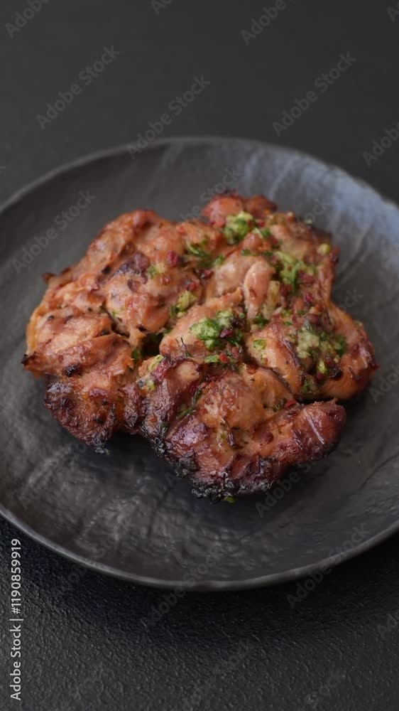 Grilled chicken fillet with garlic sauce, hot pepper, salt, spices and herbs Grilled chicken fillet with garlic sauce, hot pepper, salt, spices and herbs