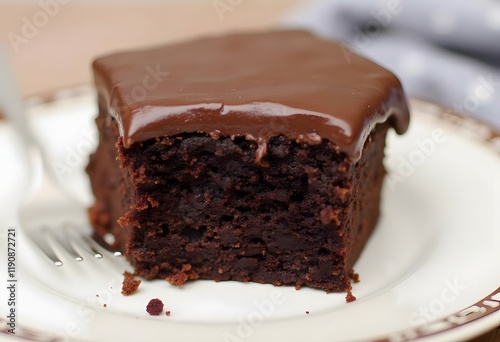 Delicious slice of chocolate cake with coffee on a plate photo