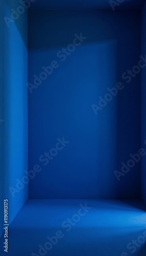 A minimalist blue room creating a calm and serene atmosphere for creative inspiration.