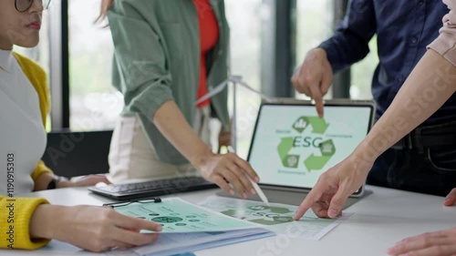 Young Asian business team discussion reusable product in office,start up eco-friendly business,environmental protection,sustainable business model,ESG strategy,team meeting,people work at home concept