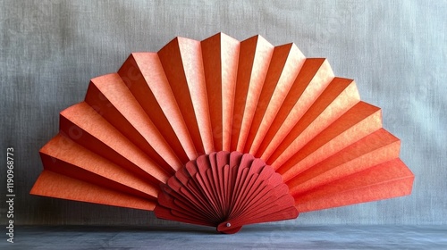 Colorful paper fan displayed against a plain background showcasing elegant cr...