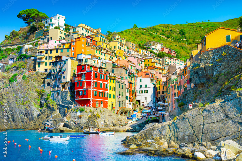 Riomaggiore of Cinque Terre, Italy - Traditional fishing village in La Spezia, situate in coastline of Liguria of Italy. Riomaggiore is one of the five Cinque Terre travel attractions.