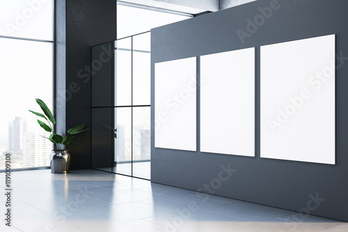 Fototapeta Naklejka Na Ścianę i Meble -  Modern interior with three blank vertical posters on dark wall near large windows with city view and plant in pot. 3D Rendering