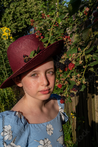 portrait of a girl with green eyes in a garden	