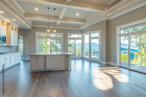 Spacious kitchen with island and stunning mountain view. Perfect for real estate, home design, or lifestyle publications.
