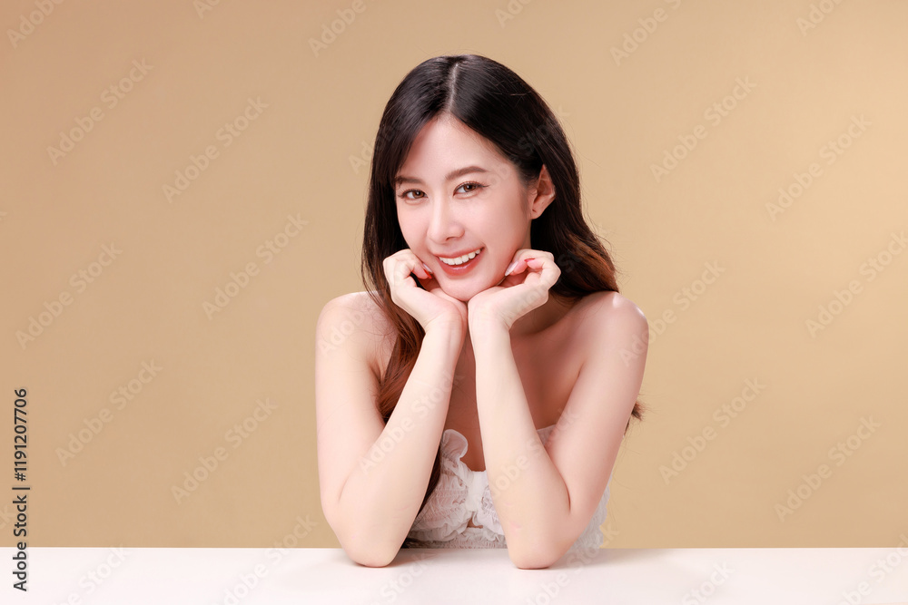 Beauty portraits of young Asian woman with clean fresh skin on beige background. Cute female model, beauty blogger make up artist in studio. Skincare, plastic surgery, spa concept. Beauty portraits of young Asian woman with clean fresh skin on beige background. Cute female model, beauty blogger make up artist in studio. Skincare, plastic surgery, spa concept.