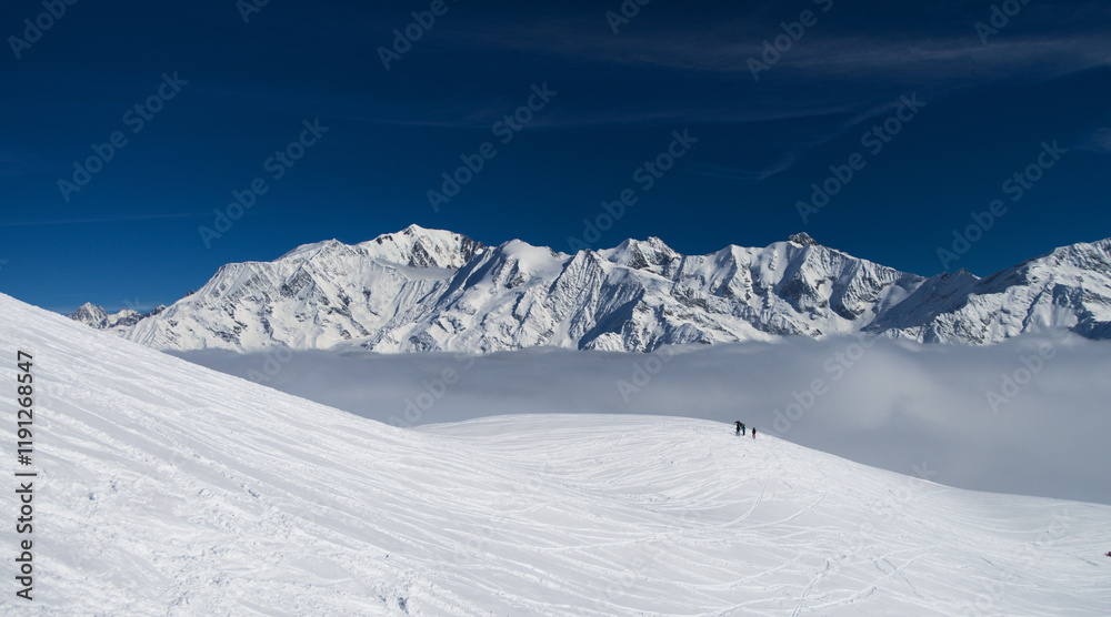 view on Mont Blanc massive over clouds, Les Contamines sky resort, France view on Mont Blanc massive over clouds, Les Contamines sky resort, France