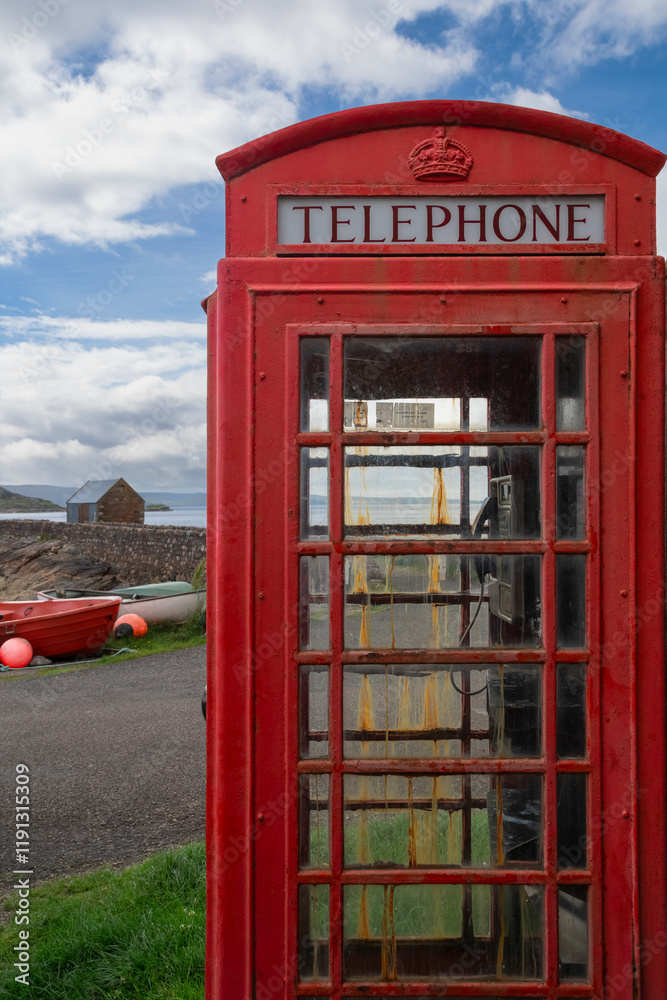 Traditional Red British Phone Booth on the Coast in Lower Diabaig, Torridon, Scotland Traditional Red British Phone Booth on the Coast in Lower Diabaig, Torridon, Scotland