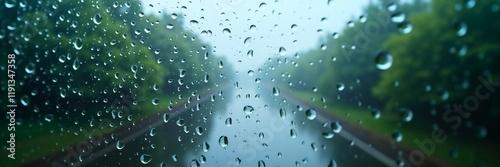 Close-up of water droplets on a glass surface, glistening under soft light. The serene and refreshing scene evokes a tranquil rainy day, perfect for calm inspiration.