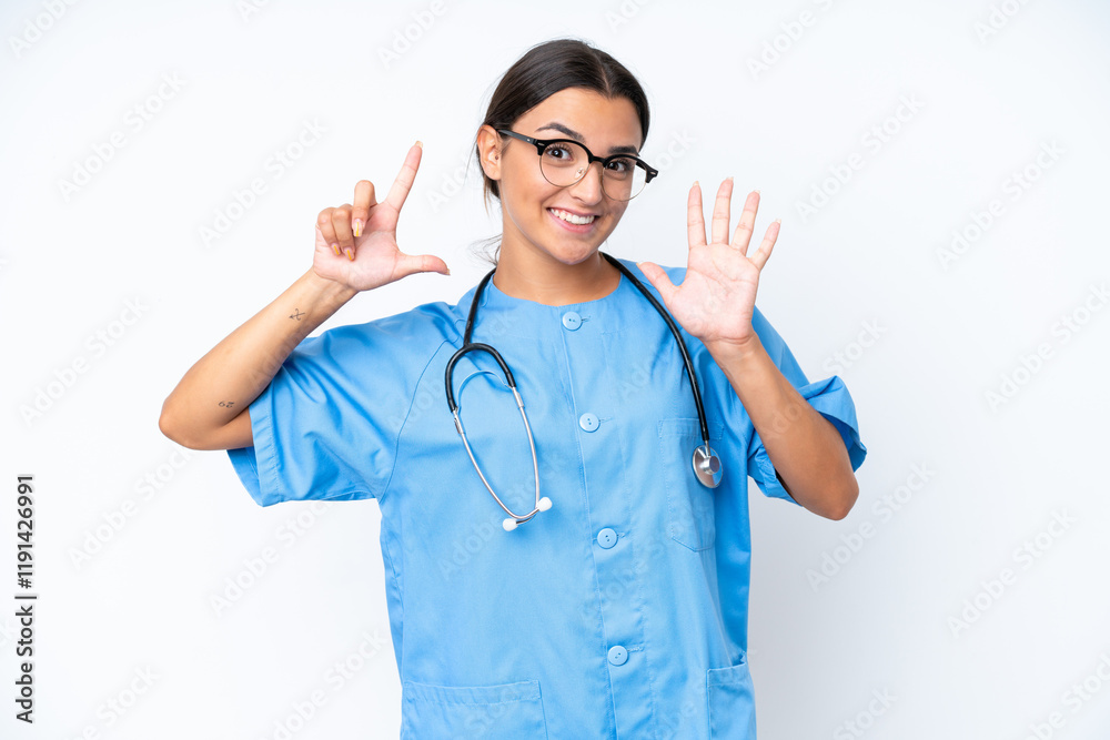 Young nurse woman isolated on white background counting seven with fingers Young nurse woman isolated on white background counting seven with fingers