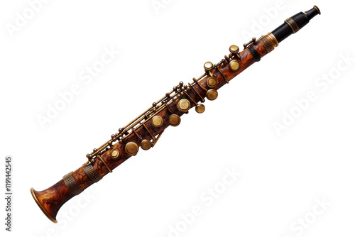 Vintage oboe lies on a textured surface showcasing its intricate design and craftsmanship in soft lighting