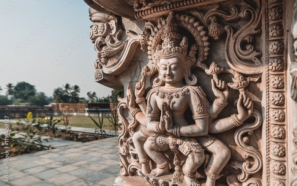 Intricate stone carving of a deity in a serene garden setting. Intricate stone carving of a deity in a serene garden setting.