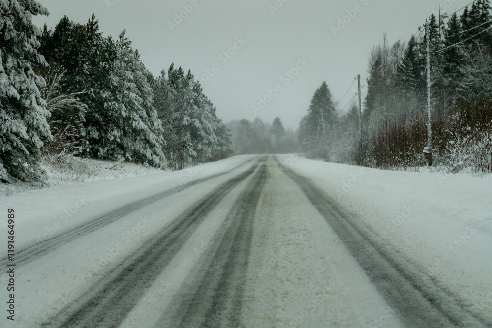 Snowy Winter Road Through Forest. Silent Journey on a Frosty Path. Snowy Winter Road Through Forest. Silent Journey on a Frosty Path.