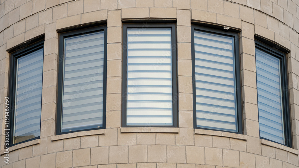Fototapeta premium Abstract shot of windows on the wall with curvature 