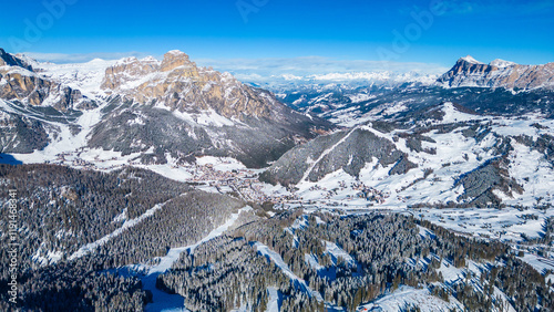 Gruppo del Sella and the famous Sellaronda ski circuit shine in this breathtaking winter aerial view, captured by drone. The Piz Boè station on the Alta Badia ski resort reveals its alpine charm photo