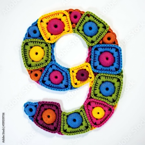 Letter or number crafted from colorful crochet granny squares in vibrant fuchsia, lime green, royal blue, and yellow on a white background
