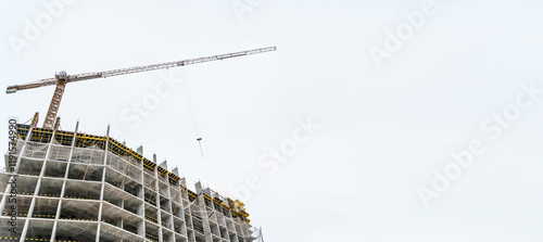 Construction site with crane and building house on white banner background 