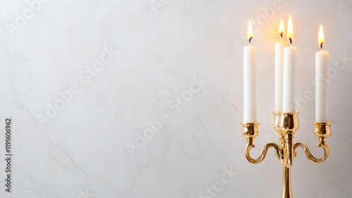 Golden candelabrum holds six lit candles against marble background