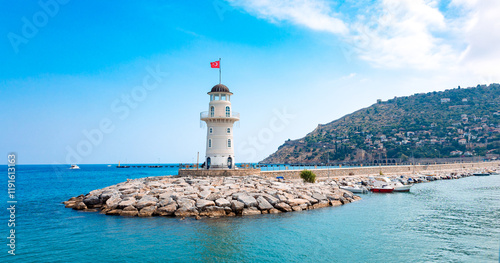 Panoramic view of old lighthouse in Alanya port. Landscape view of Mediterranean coast, Alanya, Turkey. High quality photo