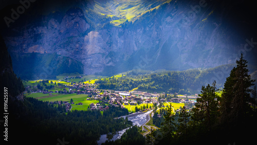 Landscape with mountains and Kandersteg city in the bottom of the valley. Switzerland  photo