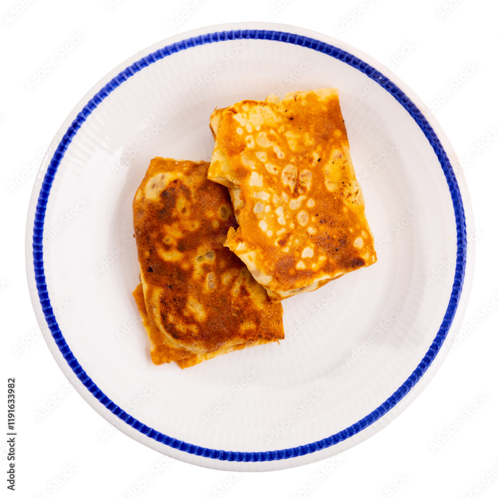 Delectable pancakes, featuring filling of minced liver and eggs, perfect for your next breakfast. Isolated over white background Delectable pancakes, featuring filling of minced liver and eggs, perfect for your next breakfast. Isolated over white background