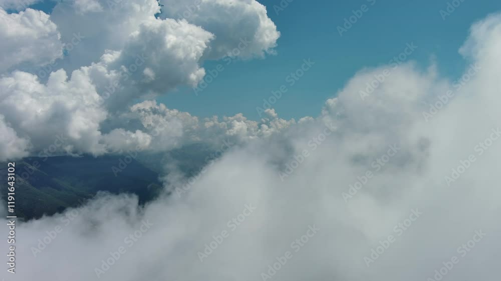 Aerial view on clouds over Kotor Bay, Montenegro. Flying in clouds over sea bay, 4k Aerial view on clouds over Kotor Bay, Montenegro. Flying in clouds over sea bay, 4k