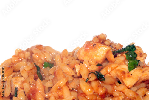 Close Up of Tomoto Based Orzo Rice Sauce Dinner Snack Dish on a White Background photo