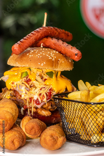Fast food. American-style hamburger served with fries.