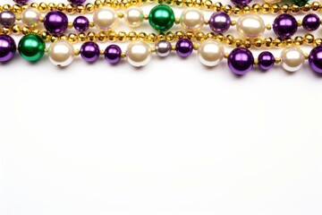 Colorful mardi gras beads creating a festive border on a white background, ideal for celebratory designs