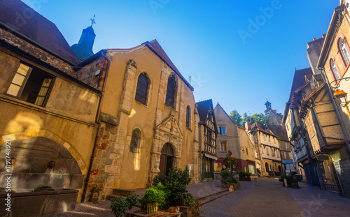 Cityscape of old French town of Montlucon with typical half-timbered buildings photo