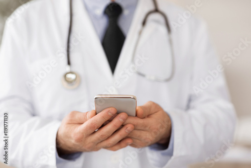 Telemedicine Concept. Closeup of male medical practitioner wearing unifrom chatting with patients photo