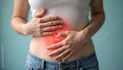 Experiencing abdominal pain, woman holds her stomach in discomfort. image captures struggle of dealing with stomach issues
