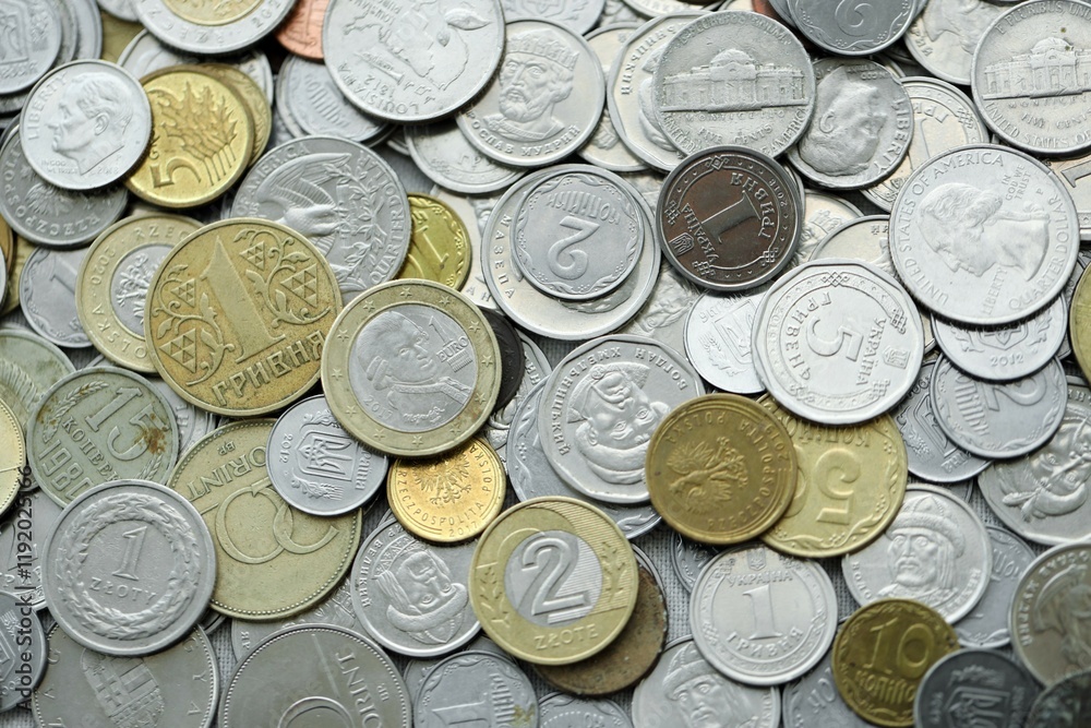 Big pile of different coins from various currencies and different countries around the world. Currency exchange Big pile of different coins from various currencies and different countries around the world. Currency exchange