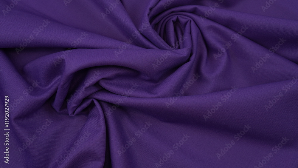 Obraz premium Close-up of dark purple cotton fabric showcasing a rich, deep hue with a detailed woven texture, soft natural fibers, and a smooth surface ideal for design or background use.