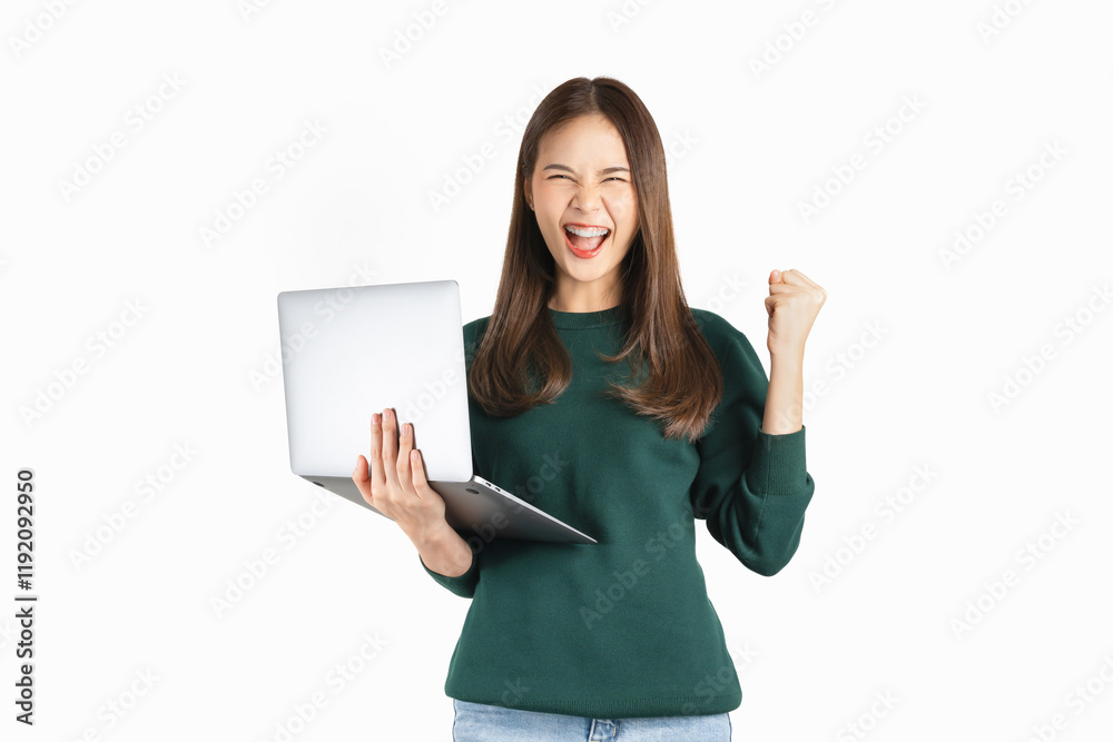 Cheerful beautiful Asian woman holding laptop with fists clenched celebrating victory expressing success on white background. Cheerful beautiful Asian woman holding laptop with fists clenched celebrating victory expressing success on white background.