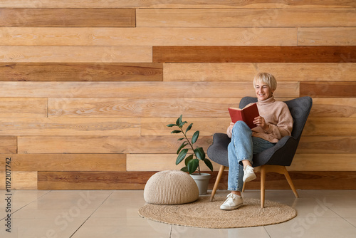 Old woman reading book in a...