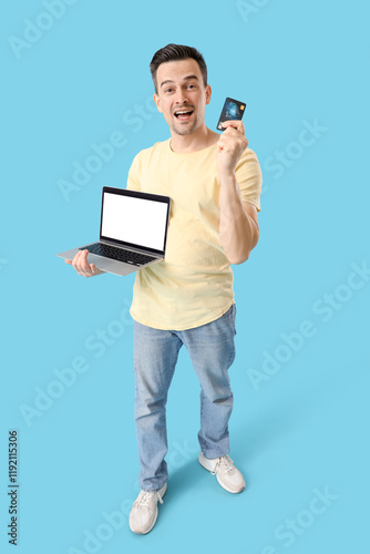Man with credit card and la...