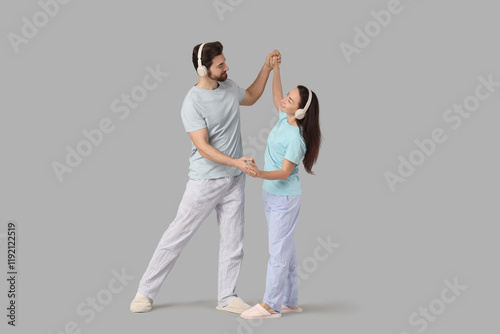 Loving couple in pajamas wi...