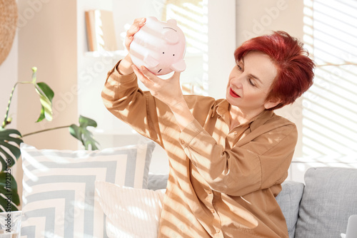 Mature redhead woman with e...