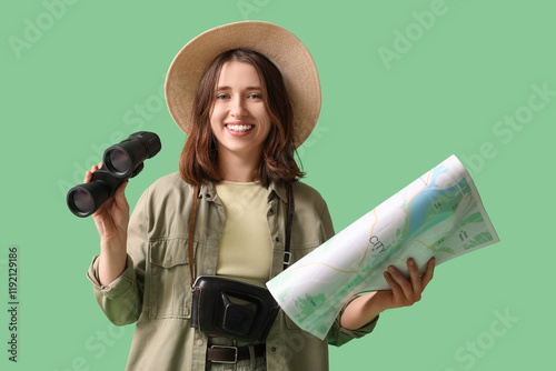 Female traveler with map an...