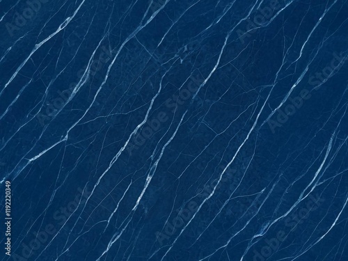 Dark blue marble texture with elegant white veining patterns, perfect for backgrounds, design projects, or architectural elements