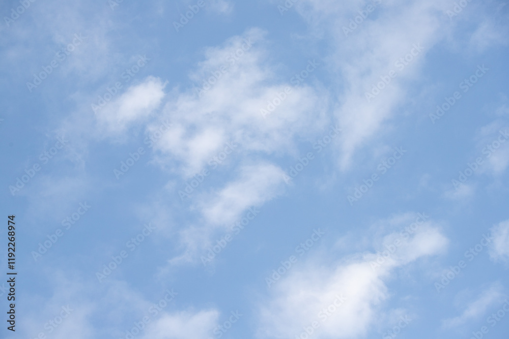 Sky background with clouds. White clouds against a blue sky. Sky background with clouds. White clouds against a blue sky.