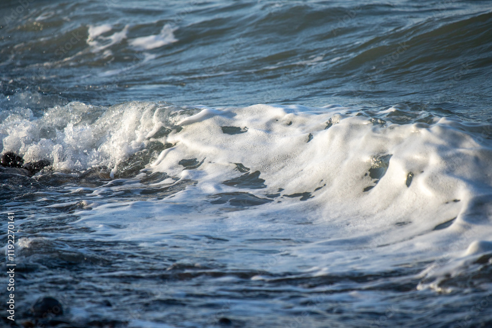Seashore, small stones, sea wave. Marine background. Seashore, small stones, sea wave. Marine background.